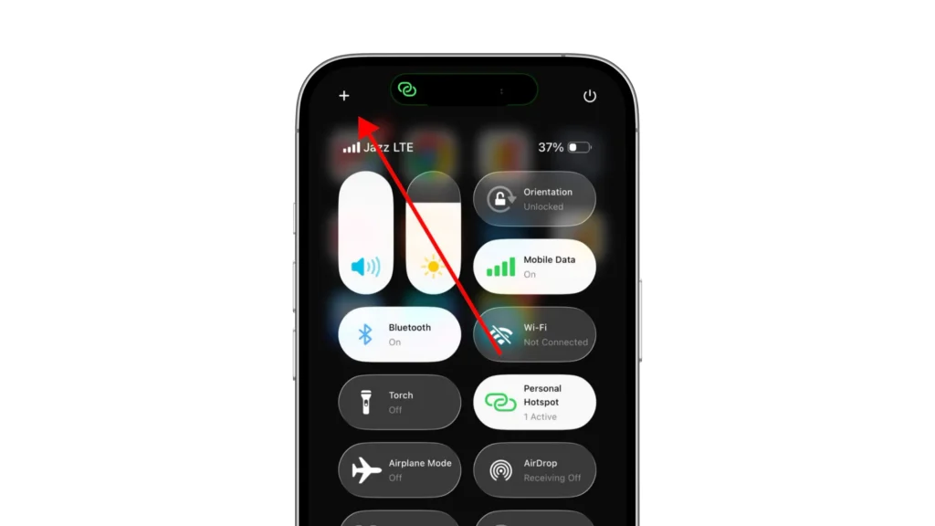 iPhone Control Center with an arrow pointing to the plus button for adding controls